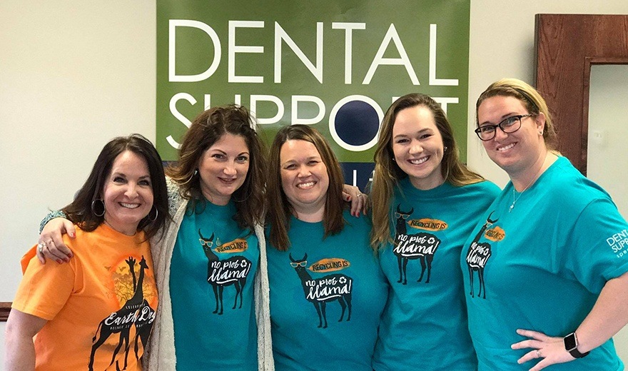 Team members wearing fun animal shirts