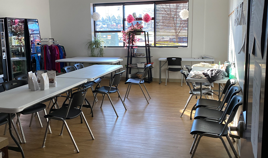 Tables and chairs set up in office