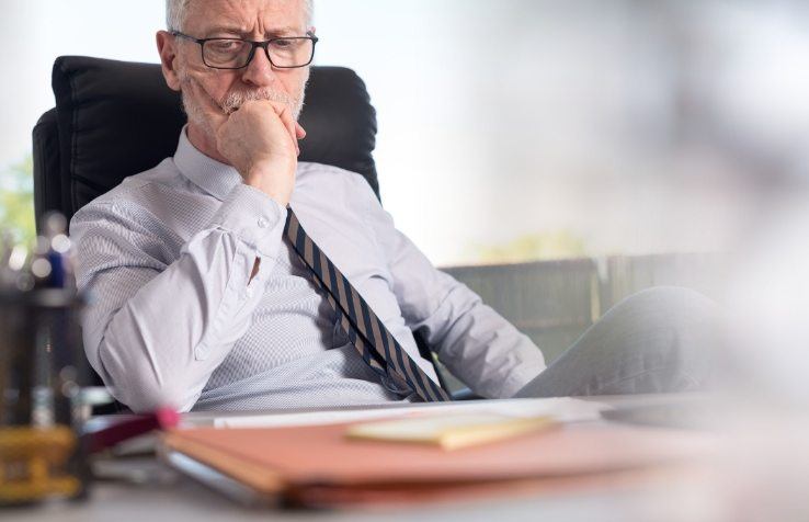 Team member contemplating common chart auditing problems