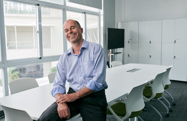 Friendly team member smiling in conference room