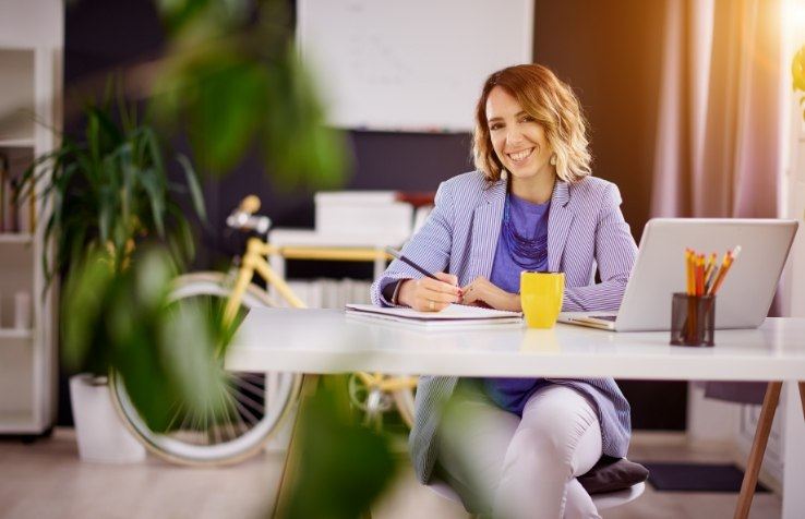 Friendly team member at her desk