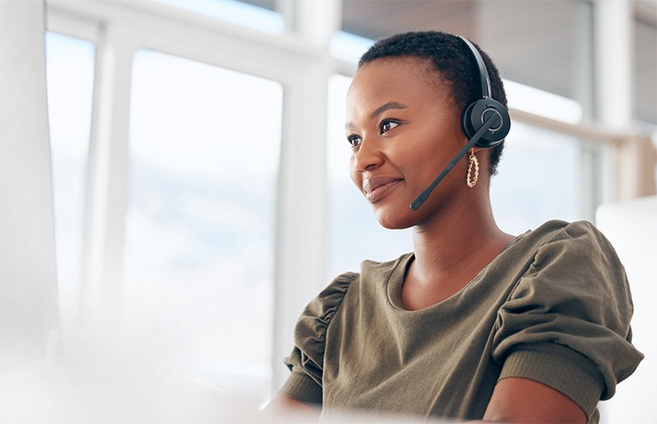 Smiling person with a headset