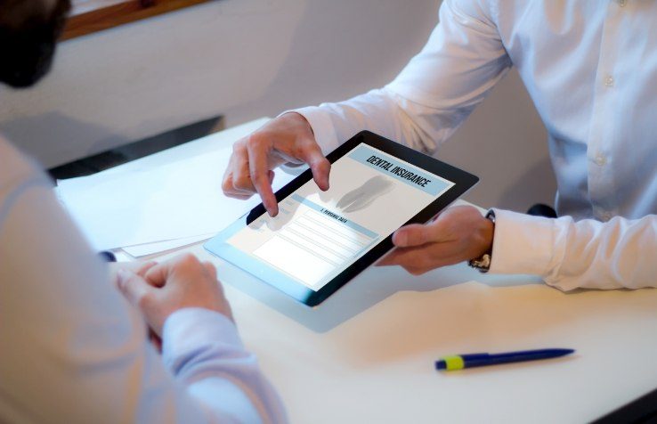 Dental insurance forms on tablet computer