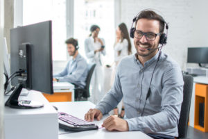 Smiling male customer support specialist