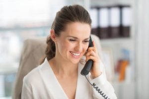 A woman speaking on the phone.