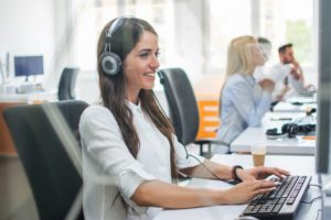 woman smiling headset