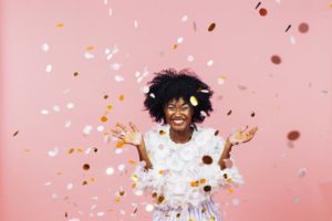 woman smiling confetti