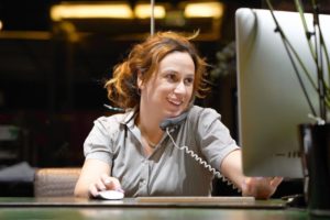 front desk person streamlining dental insurance verification