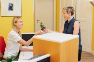 dental staff welcoming new patients