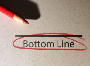 the words “Bottom Line” circled in red pencil