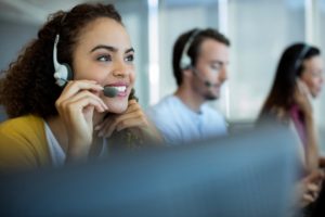 call-answering team with headsets on