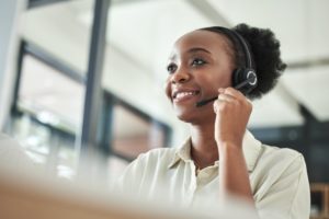 woman talking on a phone headset