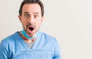 surprised dentist with an open mouth