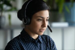 closeup of a woman with a phone headset